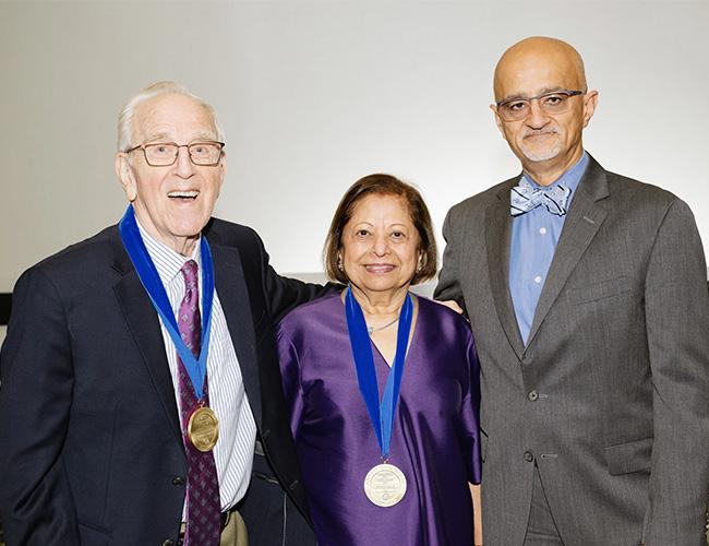 Tufts Dental school Deans Medal recipients posting with the Dental School Dean