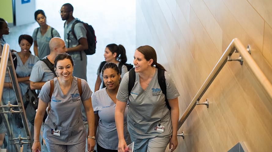 Students walking up the stairs