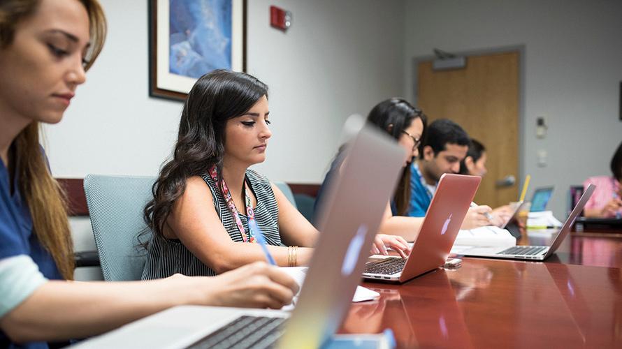 Students studying at TUSDM