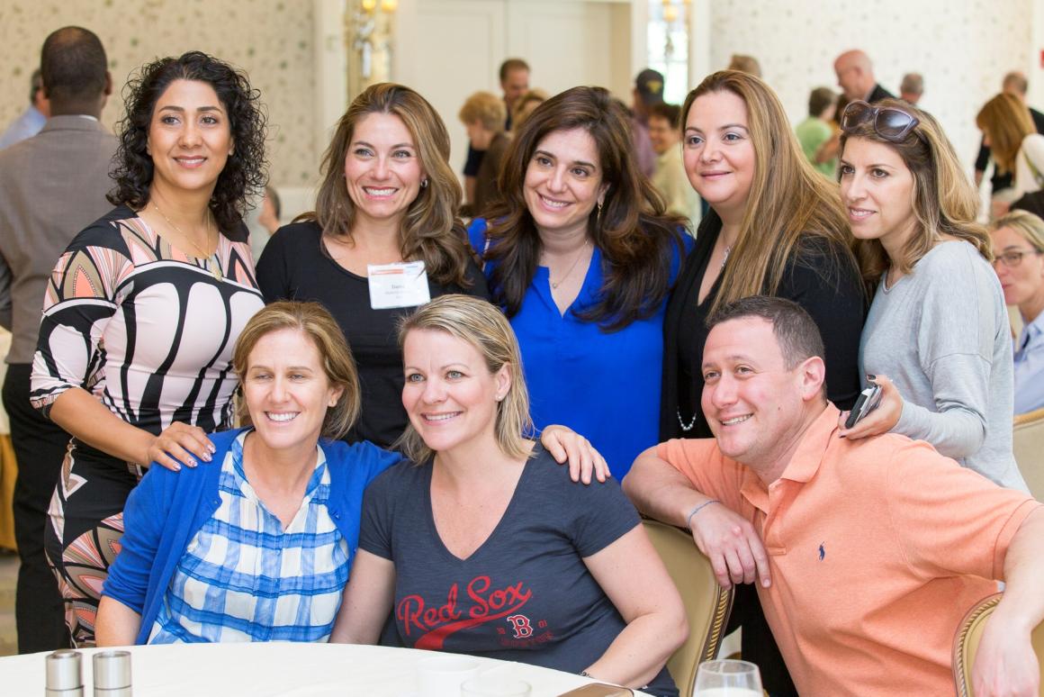 Alumni posing for a picture during their reunion