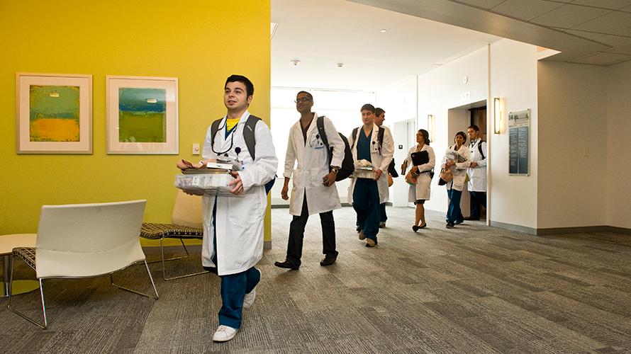 Students waling to the Simulation Learning Center