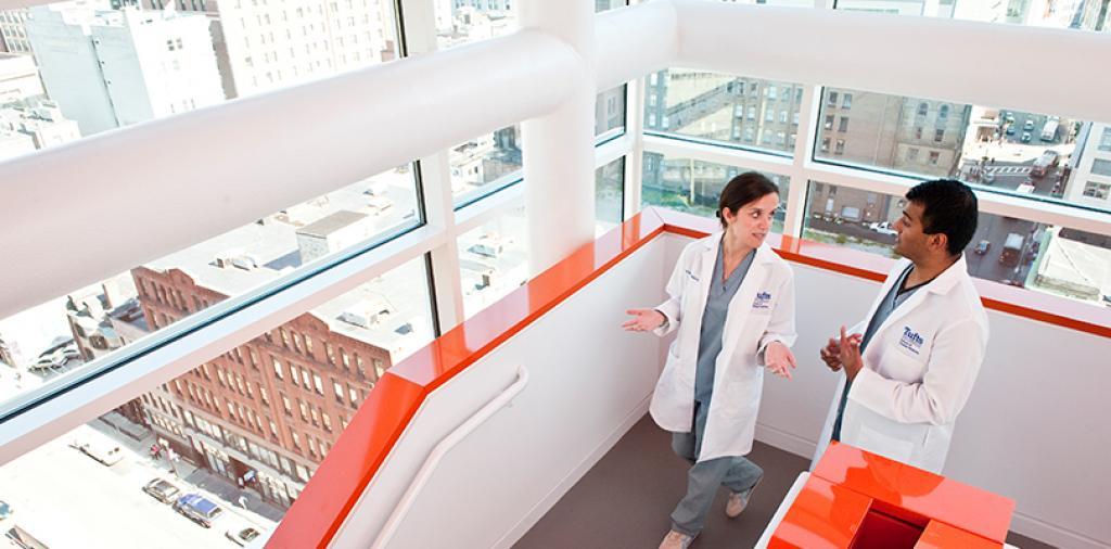 Dentists walking down a flight of stairs