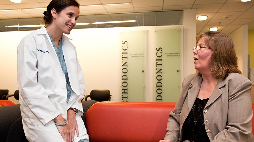 Resident welcoming a patient