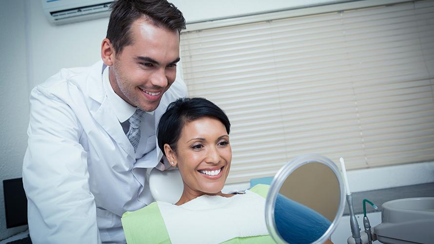 Dentist with patient