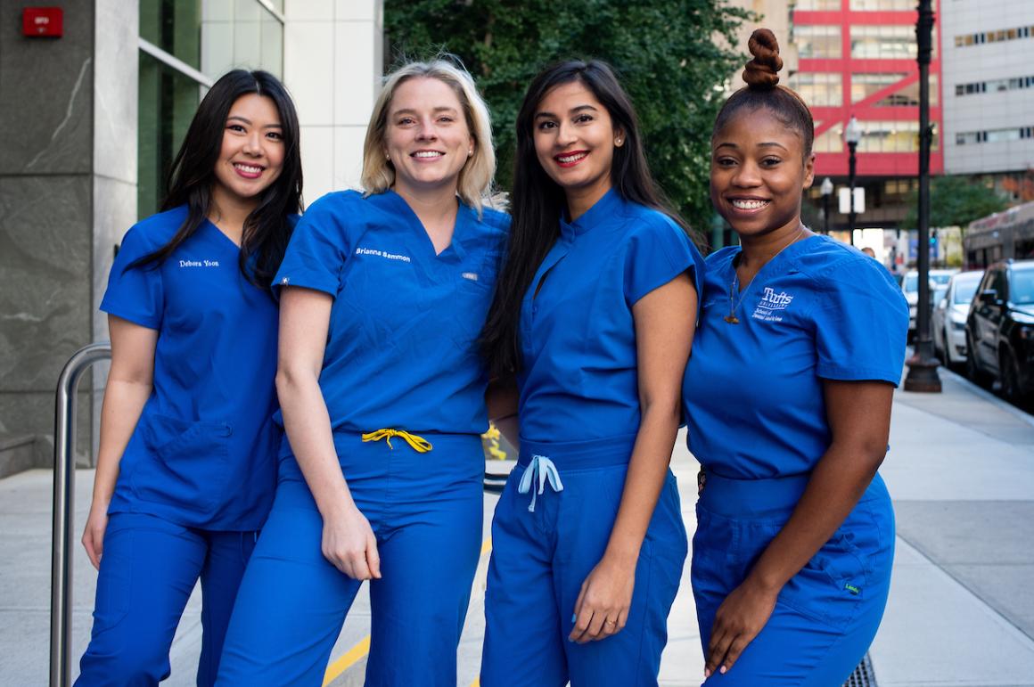 4 female dental students of diverse backgrounds