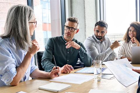 Executives around boardroom