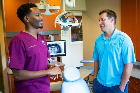 Dental student Tyrone Reese and his mentor Logan Reilly at Reilly&#039;s New Hampshire office.