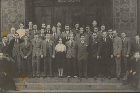 Tufts Dental College Class of 1942 on the steps of 416 Huntington Ave. Esther Kaplan Colchamiro is first row center.